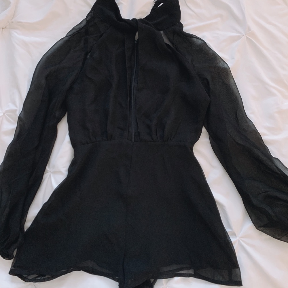 Black mesh romper with open middle